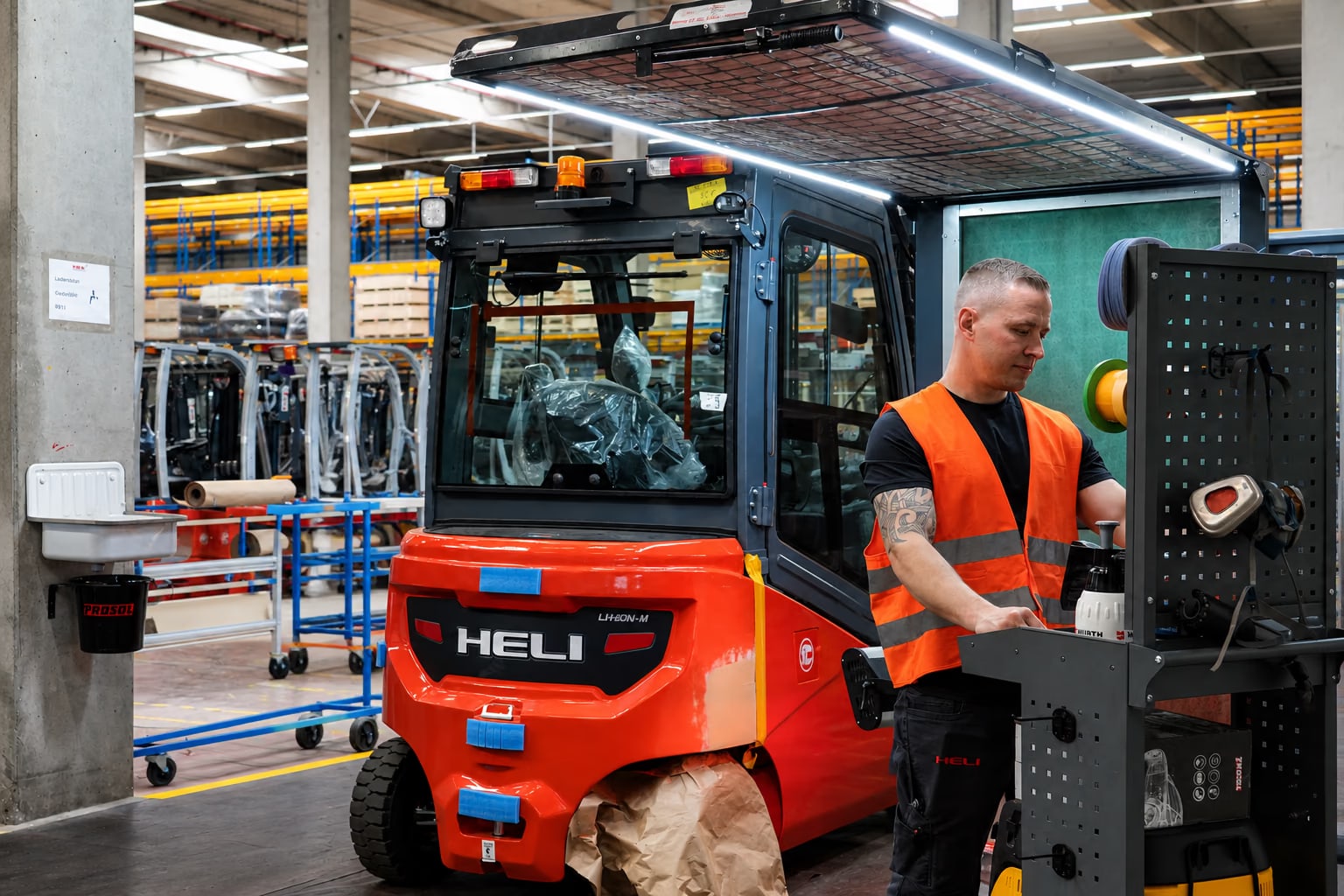 HELI service technician working on an industrial truck